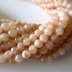 Shop Moonstone Round Beads! Natural Peach Moonstone 4mm Smooth Round Beads,  13.5 Inch Strand, GDS62 | Natural genuine round Moonstone beads for beading and jewelry making.  #jewelry #beads #beadedjewelry #diyjewelry #jewelrymaking #beadstore #beading #affiliate #ad