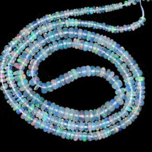 Shop Opal Rondelle Beads! AAA+ Ethiopian Welo Opal Fire Rondelle Beads | Gemstone 3mm-4.5mm Beads | Natural Ethiopian Opal Gemstone Smooth Rondelles | Welo Opal Beads | Natural genuine rondelle Opal beads for beading and jewelry making.  #jewelry #beads #beadedjewelry #diyjewelry #jewelrymaking #beadstore #beading #affiliate #ad