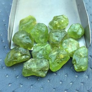 5 Piece Gemstone Rough 13-14 MM,Peridot Gemstone Raw,Powerful stone Dainty Peridot Rough, Natural Peridot Raw August Birthstone Crystal Raw | Natural genuine stones & crystals in various shapes & sizes. Buy raw cut, tumbled, or polished gemstones for making jewelry or crystal healing energy vibration raising reiki stones. #crystals #gemstones #crystalhealing #crystalsandgemstones #energyhealing #affiliate #ad