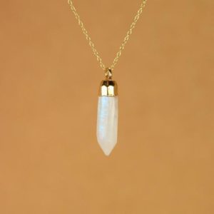 Shop Rainbow Moonstone Jewelry! Moonstone necklace – rainbow moonstone – gold moonstone – blue flash – a gold dipped moonstone spike on a 14k gold vermeil chain | Natural genuine Rainbow Moonstone jewelry. Buy crystal jewelry, handmade handcrafted artisan jewelry for women.  Unique handmade gift ideas. #jewelry #beadedjewelry #beadedjewelry #gift #shopping #handmadejewelry #fashion #style #product #jewelry #affiliate #ad