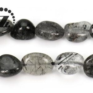 Shop Rutilated Quartz Chip & Nugget Beads! Black Rutilated Quartz pebble chips beads,pebble nugget beads,Rutilated Quartz Natural,DIY beads,5-8mm,15" full strand | Natural genuine chip Rutilated Quartz beads for beading and jewelry making.  #jewelry #beads #beadedjewelry #diyjewelry #jewelrymaking #beadstore #beading #affiliate #ad