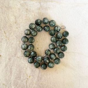 Shop Seraphinite Necklaces! Seraphinite 12mm Round Beaded Necklace with a Sterling Silver Hook and Eye Clasp – Top Quality | Natural genuine Seraphinite necklaces. Buy crystal jewelry, handmade handcrafted artisan jewelry for women.  Unique handmade gift ideas. #jewelry #beadednecklaces #beadedjewelry #gift #shopping #handmadejewelry #fashion #style #product #necklaces #affiliate #ad