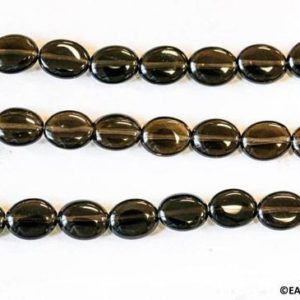 Shop Smoky Quartz Bead Shapes! M/ Smoky Quartz 8x10mm Flat Oval Beads 15.5 inches long, Brown Color Transparent Quartz, Small Size Oval, For Earring, And Jewelry Making | Natural genuine other-shape Smoky Quartz beads for beading and jewelry making.  #jewelry #beads #beadedjewelry #diyjewelry #jewelrymaking #beadstore #beading #affiliate #ad