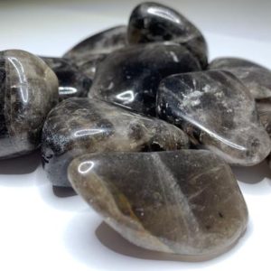 Shop Smoky Quartz Stones & Crystals! Smoky Quartz Tumbled Stones | Natural genuine stones & crystals in various shapes & sizes. Buy raw cut, tumbled, or polished gemstones for making jewelry or crystal healing energy vibration raising reiki stones. #crystals #gemstones #crystalhealing #crystalsandgemstones #energyhealing #affiliate #ad