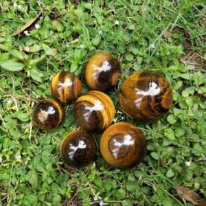 Shop Tiger Eye Stones & Crystals! AAA Tiger's Eye Sphere in Various Sizes | Natural genuine stones & crystals in various shapes & sizes. Buy raw cut, tumbled, or polished gemstones for making jewelry or crystal healing energy vibration raising reiki stones. #crystals #gemstones #crystalhealing #crystalsandgemstones #energyhealing #affiliate #ad