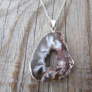 Shop Agate Necklaces! Agate Slice Necklace, slab of agate with silver edges and silver chain, geode slice | Natural genuine Agate necklaces. Buy crystal jewelry, handmade handcrafted artisan jewelry for women.  Unique handmade gift ideas. #jewelry #beadednecklaces #beadedjewelry #gift #shopping #handmadejewelry #fashion #style #product #necklaces #affiliate #ad