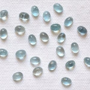 Shop Aquamarine Cabochons! Natural Aquamarine Cabochon, Aquamarine Loose Gemstone, African Aquamarine, Sea Blue Oval Shape Cabochon 6 Pieces Lot, 5x7mm #GNRA0106 | Natural genuine stones & crystals in various shapes & sizes. Buy raw cut, tumbled, or polished gemstones for making jewelry or crystal healing energy vibration raising reiki stones. #crystals #gemstones #crystalhealing #crystalsandgemstones #energyhealing #affiliate #ad