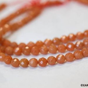 Shop Aventurine Faceted Beads! S/ Red Aventurine 6mm/ 4mm Faceted Round beads 16" strand Natural orange quartz beads Shade varies For jewelry making | Natural genuine faceted Aventurine beads for beading and jewelry making.  #jewelry #beads #beadedjewelry #diyjewelry #jewelrymaking #beadstore #beading #affiliate #ad