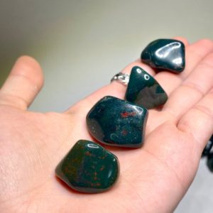Shop Bloodstone Stones & Crystals! Bloodstone Tumbled Stone | Natural genuine stones & crystals in various shapes & sizes. Buy raw cut, tumbled, or polished gemstones for making jewelry or crystal healing energy vibration raising reiki stones. #crystals #gemstones #crystalhealing #crystalsandgemstones #energyhealing #affiliate #ad