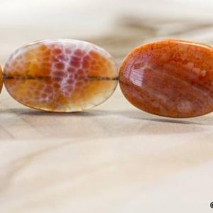 XL/ Crab Fire Agate 22x30mm Flat Oval Loose Beads Length 15.5" Unique Orange Color Agate Wholesale discount @earthstone.com | Natural genuine beads Gemstone beads for beading and jewelry making.  #jewelry #beads #beadedjewelry #diyjewelry #jewelrymaking #beadstore #beading #affiliate #ad