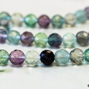 Shop Fluorite Faceted Beads! M/ Natural Rainbow Fluorite 8mm/ 10mm Faceted Round beads Multi-Color Fluorite. Transparent Purple green AAA Quality Semi-precious Stone | Natural genuine faceted Fluorite beads for beading and jewelry making.  #jewelry #beads #beadedjewelry #diyjewelry #jewelrymaking #beadstore #beading #affiliate #ad