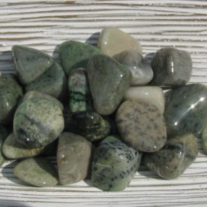 Shop Tumbled Garnet Crystals & Pocket Stones! Tumbled Green Garnet Stones for Abundance and Prosperity, Grossularite Stones, Wealth Stone, Mother Earth Connection Stone, Chakra Stone | Natural genuine stones & crystals in various shapes & sizes. Buy raw cut, tumbled, or polished gemstones for making jewelry or crystal healing energy vibration raising reiki stones. #crystals #gemstones #crystalhealing #crystalsandgemstones #energyhealing #affiliate #ad