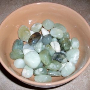 Shop Tumbled Jade Crystals & Pocket Stones! Jade Small Tumbled Stones | Natural genuine stones & crystals in various shapes & sizes. Buy raw cut, tumbled, or polished gemstones for making jewelry or crystal healing energy vibration raising reiki stones. #crystals #gemstones #crystalhealing #crystalsandgemstones #energyhealing #affiliate #ad