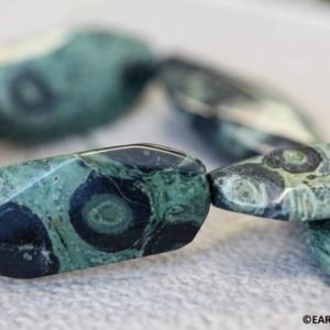 Shop Jasper Faceted Beads! XL/ Kambaba Jasper 20x45mm Faceted Slab beads 16" strand Size varies Dark green Jasper with unique black dot pattern for jewelry making | Natural genuine faceted Jasper beads for beading and jewelry making.  #jewelry #beads #beadedjewelry #diyjewelry #jewelrymaking #beadstore #beading #affiliate #ad