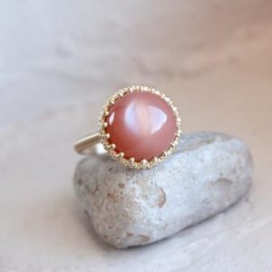 Peach Moonstone Crown Engagement Ring Romantic 14K Yellow Gold Bridal Setting Dusky Antique Rose Pink Round Cabochon Band – Peach Princess | Natural genuine Gemstone rings, simple unique alternative gemstone engagement rings. #rings #jewelry #bridal #wedding #jewelryaccessories #engagementrings #weddingideas #affiliate #ad