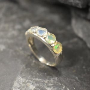 Shop Opal Rings! Opal Band, Ethiopain Opal, October Birthstone, Half Eternity Band, Opal Ring, Fire Opal Ring, Vintage Opal Ring, Solid Silver Ring, Opal | Natural genuine Opal rings, simple unique handcrafted gemstone rings. #rings #jewelry #shopping #gift #handmade #fashion #style #affiliate #ad