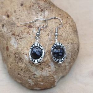 Shop Obsidian Earrings! Oval frame Snowflake Obsidian earrings. Reiki jewelry uk. Virgo jewelry. Silver plated 8mm stone dangle drop earrings | Natural genuine Obsidian earrings. Buy crystal jewelry, handmade handcrafted artisan jewelry for women.  Unique handmade gift ideas. #jewelry #beadedearrings #beadedjewelry #gift #shopping #handmadejewelry #fashion #style #product #earrings #affiliate #ad