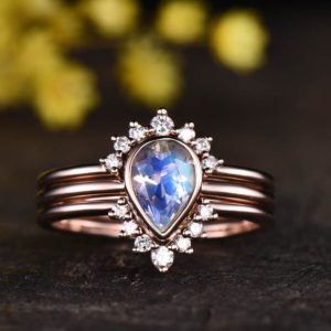Rainbow Moonstone engagement ring set in 14K/18K gold ring,vintage diamond bridal set,curved V wedding band blue Birthstone ring jewelry | Natural genuine Gemstone rings, simple unique alternative gemstone engagement rings. #rings #jewelry #bridal #wedding #jewelryaccessories #engagementrings #weddingideas #affiliate #ad