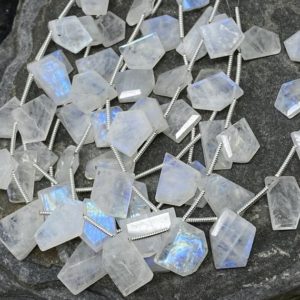 Shop Rainbow Moonstone Beads! High Quality Hand Faceted Step cut Blue Flash Rainbow Moonstone Gemstone Briolette Slices 10-20mm | Natural genuine beads Rainbow Moonstone beads for beading and jewelry making.  #jewelry #beads #beadedjewelry #diyjewelry #jewelrymaking #beadstore #beading #affiliate #ad