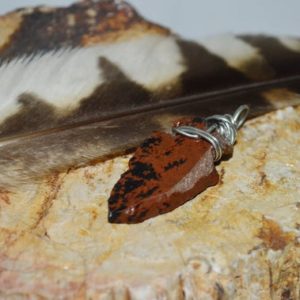 Shop Mahogany Obsidian Jewelry! Raw Mahogany Obsidian Arrowhead Pendant, Raw Mahogany Obsidian Pendant,  Gifts Under 15 Dollars, Obsidian Pendant | Natural genuine Mahogany Obsidian jewelry. Buy crystal jewelry, handmade handcrafted artisan jewelry for women.  Unique handmade gift ideas. #jewelry #beadedjewelry #beadedjewelry #gift #shopping #handmadejewelry #fashion #style #product #jewelry #affiliate #ad