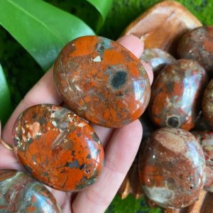 Shop Red Jasper Stones & Crystals! Brecciated red  jasper palmstone, palm stone | Natural genuine stones & crystals in various shapes & sizes. Buy raw cut, tumbled, or polished gemstones for making jewelry or crystal healing energy vibration raising reiki stones. #crystals #gemstones #crystalhealing #crystalsandgemstones #energyhealing #affiliate #ad