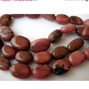 Shop Rhodonite Bead Shapes! Rhodonite Beads, Rhodonite Stone, Oval Beads, 12mm To 17mm Beads, 14 Pieces, 8 Inch Half Strand | Natural genuine other-shape Rhodonite beads for beading and jewelry making.  #jewelry #beads #beadedjewelry #diyjewelry #jewelrymaking #beadstore #beading #affiliate #ad
