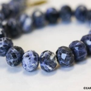 Shop Sodalite Faceted Beads! L/ Sodalite 15-16mm Faceted Rondelle beads 16" strand Natural blue gemstone beads for jelwery making | Natural genuine faceted Sodalite beads for beading and jewelry making.  #jewelry #beads #beadedjewelry #diyjewelry #jewelrymaking #beadstore #beading #affiliate #ad