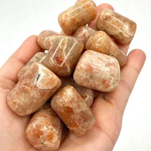 Shop Sunstone Stones & Crystals! Sunstone Tumbled Stones | Natural genuine stones & crystals in various shapes & sizes. Buy raw cut, tumbled, or polished gemstones for making jewelry or crystal healing energy vibration raising reiki stones. #crystals #gemstones #crystalhealing #crystalsandgemstones #energyhealing #affiliate #ad