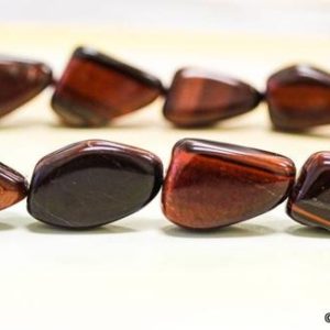 Shop Tiger Eye Chip & Nugget Beads! M/ Red Tiger Eye 12-14mm Nugget Red Brownish Tiger Eye Freeform Beads  15 inches only | Natural genuine chip Tiger Eye beads for beading and jewelry making.  #jewelry #beads #beadedjewelry #diyjewelry #jewelrymaking #beadstore #beading #affiliate #ad