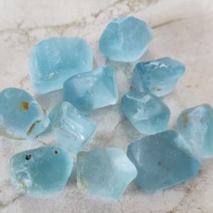 Shop Raw & Rough Topaz Stones! Blue Topaz Raw  10 / 25 Piece LOT , Blue Topaz Crystal, Natural Gemstone, Healing Crystal Raw,8×10, 10×12,12×15,15×20 mm size available | Natural genuine stones & crystals in various shapes & sizes. Buy raw cut, tumbled, or polished gemstones for making jewelry or crystal healing energy vibration raising reiki stones. #crystals #gemstones #crystalhealing #crystalsandgemstones #energyhealing #affiliate #ad