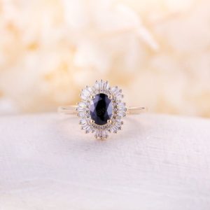 Vintage black onyx engagement ring art deco oval shaped yellow gold ring diamond double halo antique wedding bridal ring Anniversary Promise | Natural genuine Gemstone rings, simple unique alternative gemstone engagement rings. #rings #jewelry #bridal #wedding #jewelryaccessories #engagementrings #weddingideas #affiliate #ad