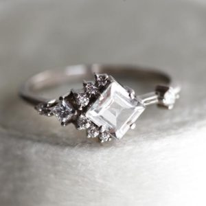 Shop Handmade Gemstone Engagement Rings! White Sapphire Engagement Ring, Sapphire Diamond Ring, Unique White Gold Sapphire Cluster Ring With White Princess Sapphire and Diamonds | Natural genuine Gemstone rings, simple unique alternative gemstone engagement rings. #rings #jewelry #bridal #wedding #jewelryaccessories #engagementrings #weddingideas #affiliate #ad