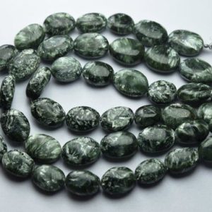 Shop Seraphinite Beads! 8 Inch Strand,Natural Green Seraphinite Faceted Oval Beads,Size 11-12mm | Natural genuine other-shape Seraphinite beads for beading and jewelry making.  #jewelry #beads #beadedjewelry #diyjewelry #jewelrymaking #beadstore #beading #affiliate #ad
