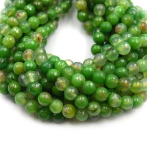 Shop Agate Faceted Beads! Dyed Agate Beads | Dyed Mixed Green Faceted Round Gemstone Beads | 6mm 8mm 10mm Available | Natural genuine faceted Agate beads for beading and jewelry making.  #jewelry #beads #beadedjewelry #diyjewelry #jewelrymaking #beadstore #beading #affiliate #ad