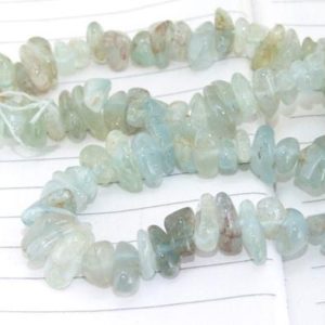 Shop Aquamarine Chip & Nugget Beads! Full Strand Natural Nugget  Aquamarine Beads —– 7mmx10mm —– about 100Pieces —– gemstone beads— 16" in length | Natural genuine chip Aquamarine beads for beading and jewelry making.  #jewelry #beads #beadedjewelry #diyjewelry #jewelrymaking #beadstore #beading #affiliate #ad