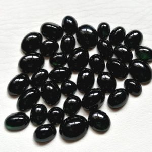 Black Tourmaline cabochons 20x15MM to 11x9MM size. Natural Tourmaline handpolished cabochons. | Natural genuine stones & crystals in various shapes & sizes. Buy raw cut, tumbled, or polished gemstones for making jewelry or crystal healing energy vibration raising reiki stones. #crystals #gemstones #crystalhealing #crystalsandgemstones #energyhealing #affiliate #ad