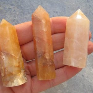 Shop Calcite Stones & Crystals! ONE (1) Honey Calcite Point, Polished Gemstone Tower, Obelisk Mineral Specimen, Meditation Stone, Reiki, 2.5- 3.75 inches 62mm – 89mm | Natural genuine stones & crystals in various shapes & sizes. Buy raw cut, tumbled, or polished gemstones for making jewelry or crystal healing energy vibration raising reiki stones. #crystals #gemstones #crystalhealing #crystalsandgemstones #energyhealing #affiliate #ad