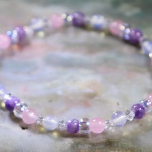 Shop Charoite Bracelets! Sagittarius Girl's Power Healing Stone Bracelet with Charoite, Opalite & Pink Chalcedony! | Natural genuine Charoite bracelets. Buy crystal jewelry, handmade handcrafted artisan jewelry for women.  Unique handmade gift ideas. #jewelry #beadedbracelets #beadedjewelry #gift #shopping #handmadejewelry #fashion #style #product #bracelets #affiliate #ad