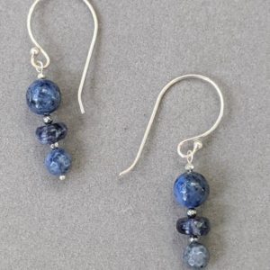 Shop Dumortierite Earrings! Dumortierite and sodalite blue grays cascade from curvy sterling silver earwires | Natural genuine Dumortierite earrings. Buy crystal jewelry, handmade handcrafted artisan jewelry for women.  Unique handmade gift ideas. #jewelry #beadedearrings #beadedjewelry #gift #shopping #handmadejewelry #fashion #style #product #earrings #affiliate #ad