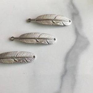 Shop Jewelry Connectors! Feather charm, feather bracelet connector, jewelry making, jewelry findings, feather pendant, DIY jewelry, bulk order, indian charm, native | Shop jewelry making and beading supplies, tools & findings for DIY jewelry making and crafts. #jewelrymaking #diyjewelry #jewelrycrafts #jewelrysupplies #beading #affiliate #ad