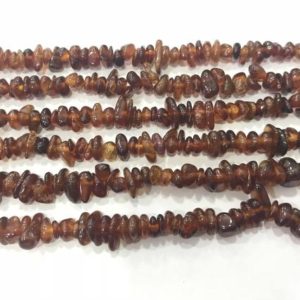 Shop Garnet Chip & Nugget Beads! Natural Orange Garnet 5-8mm Chips Genuine Loose Nugget Beads 34 inch Jewelry Supply Bracelet Necklace Material Support | Natural genuine chip Garnet beads for beading and jewelry making.  #jewelry #beads #beadedjewelry #diyjewelry #jewelrymaking #beadstore #beading #affiliate #ad