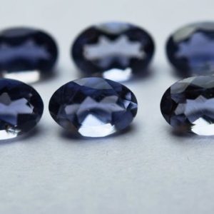 Shop Iolite Faceted Beads! 20 Pcs,Finest Quality,Natural Iolite Faceted Oval Shaped Cabochon,Size 4x6mm | Natural genuine faceted Iolite beads for beading and jewelry making.  #jewelry #beads #beadedjewelry #diyjewelry #jewelrymaking #beadstore #beading #affiliate #ad