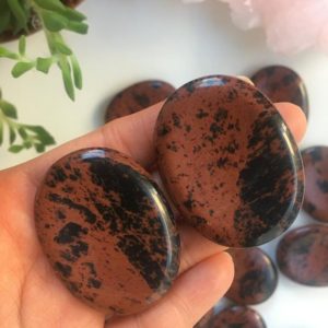Shop Mahogany Obsidian Stones & Crystals! Mahogany Obsidian Worry Stone, Mahogany Obsidian Pocket Stone, Reb Obsidian, Palm Stone, Polished Mahogany Obsidian, Chakra Worry Stone | Natural genuine stones & crystals in various shapes & sizes. Buy raw cut, tumbled, or polished gemstones for making jewelry or crystal healing energy vibration raising reiki stones. #crystals #gemstones #crystalhealing #crystalsandgemstones #energyhealing #affiliate #ad