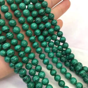 Shop Malachite Round Beads! 8mm Natural Malachite Beads,Round Gemstone Beads,Wholesale Beads | Natural genuine round Malachite beads for beading and jewelry making.  #jewelry #beads #beadedjewelry #diyjewelry #jewelrymaking #beadstore #beading #affiliate #ad