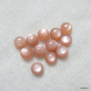Shop Moonstone Cabochons! 10 pieces 10mm Peach Moonstone cabochon round loose gemstone, Peach Moonstone round cabochon loose gemstone, Peach Moonstone Cabochon Round | Natural genuine stones & crystals in various shapes & sizes. Buy raw cut, tumbled, or polished gemstones for making jewelry or crystal healing energy vibration raising reiki stones. #crystals #gemstones #crystalhealing #crystalsandgemstones #energyhealing #affiliate #ad