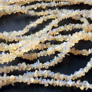 Shop Opal Chip & Nugget Beads! 4-8mm Ethiopian Welo Opal Plain Chip Beads, Ethiopian Fire Opal Beads, Opal For Necklace, 17 Inch Ehtiopian Fire Opal Chips – PGP1003 | Natural genuine chip Opal beads for beading and jewelry making.  #jewelry #beads #beadedjewelry #diyjewelry #jewelrymaking #beadstore #beading #affiliate #ad