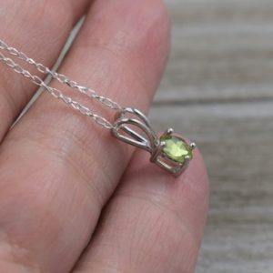 Shop Peridot Pendants! Peridot Pendant (Sterling Silver) – Mini – Genuine Faceted Gemstone – 6 x 4 mm Oval – Choice of Chain | Natural genuine Peridot pendants. Buy crystal jewelry, handmade handcrafted artisan jewelry for women.  Unique handmade gift ideas. #jewelry #beadedpendants #beadedjewelry #gift #shopping #handmadejewelry #fashion #style #product #pendants #affiliate #ad