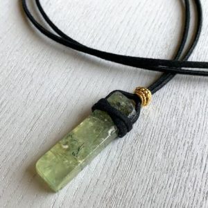 Shop Prehnite Necklaces! Prehnite Pendant Necklace Adjustable Cord Raw Stone, Black Cord Crystal Necklace Men, Prehnite Necklace Him or Her, Self Love Stone Necklace | Natural genuine Prehnite necklaces. Buy crystal jewelry, handmade handcrafted artisan jewelry for women.  Unique handmade gift ideas. #jewelry #beadednecklaces #beadedjewelry #gift #shopping #handmadejewelry #fashion #style #product #necklaces #affiliate #ad
