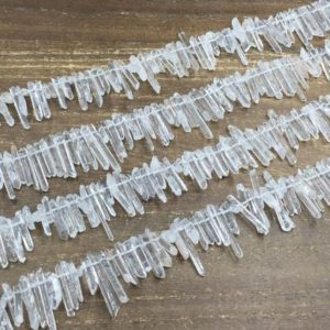 Shop Quartz Crystal Beads! Slender Tiny Clear Quartz Crystal Points Beads Polished Crystal Stick Spike Point Beads Small Quartz Point beads 3-5*10-30mm full strand | Natural genuine beads Quartz beads for beading and jewelry making.  #jewelry #beads #beadedjewelry #diyjewelry #jewelrymaking #beadstore #beading #affiliate #ad
