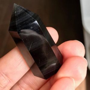 Rainbow Obsidian point wand tower | Natural genuine stones & crystals in various shapes & sizes. Buy raw cut, tumbled, or polished gemstones for making jewelry or crystal healing energy vibration raising reiki stones. #crystals #gemstones #crystalhealing #crystalsandgemstones #energyhealing #affiliate #ad